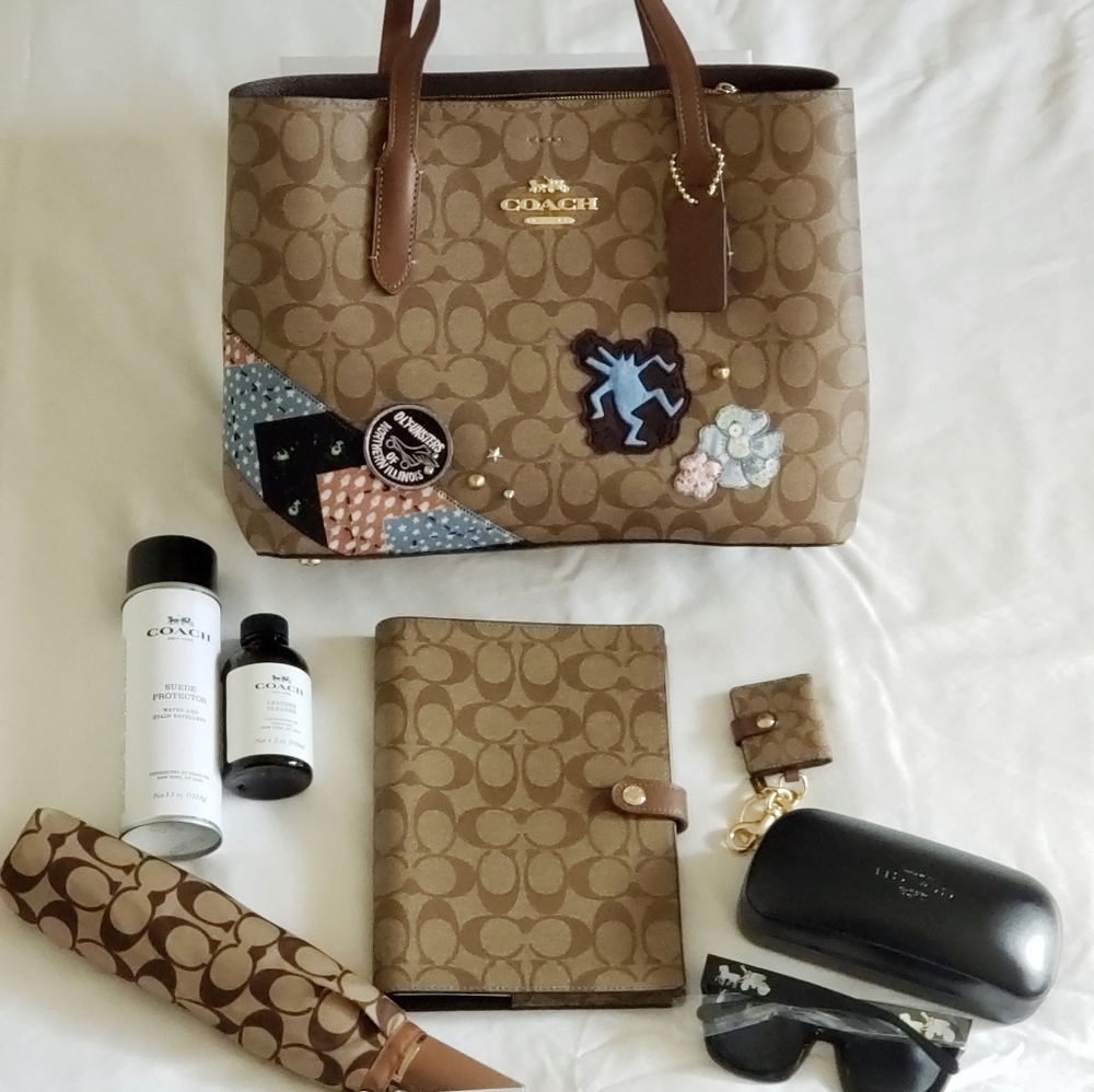 Bag($260) umbrella ($60) and sunglasse ($80)